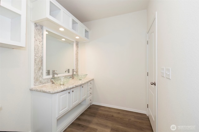 191 E Greenwood Ln, Shelton, WA 98584 - bathroom with double vanity, wood finished floors, baseboards, and recessed lighting
