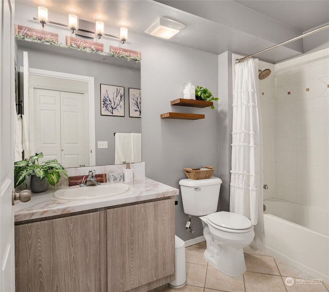 full bathroom with vanity, toilet, shower / tub combo with curtain, and tile patterned floors