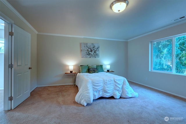 carpeted bedroom featuring multiple windows and ornamental molding