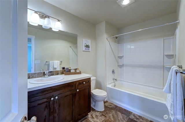 full bathroom featuring vanity, toilet, and bathtub / shower combination