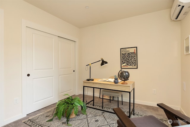 office area featuring an AC wall unit and carpet