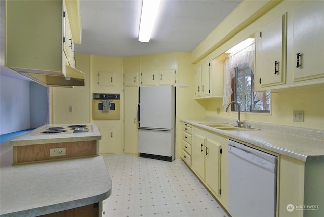 kitchen with white appliances and sink