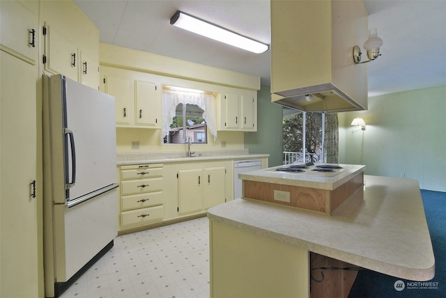 kitchen with cream cabinetry, white appliances, island range hood, and sink