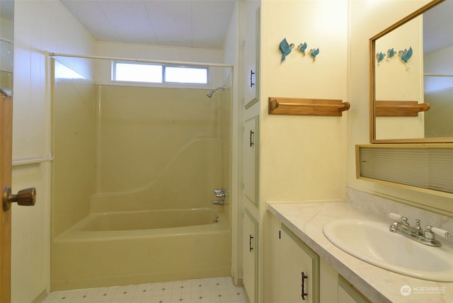 bathroom with bathing tub / shower combination and vanity