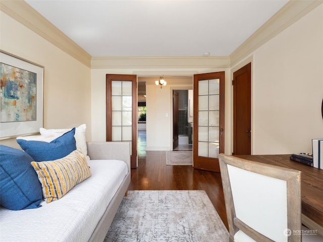 living room featuring crown molding, french doors, and dark hardwood / wood-style floors