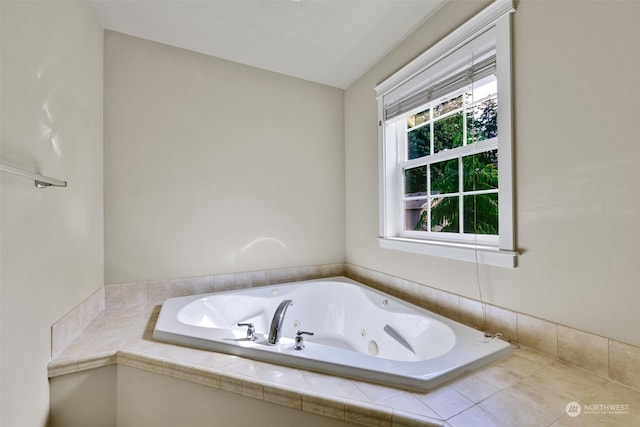 bathroom with tiled bath