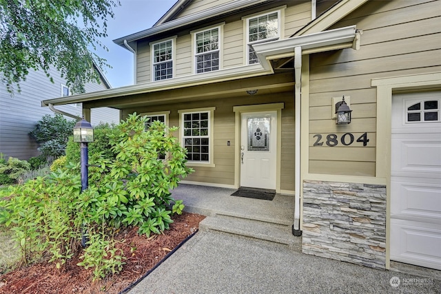 property entrance featuring a garage