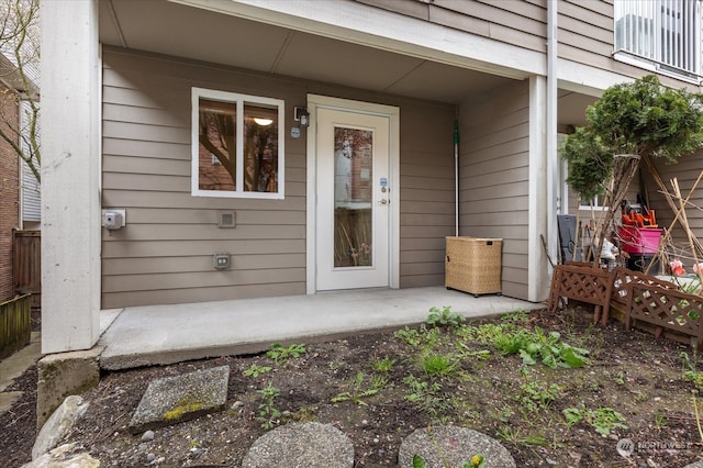 doorway to property with a patio