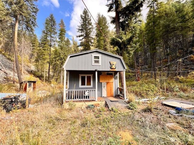 view of outbuilding featuring a porch