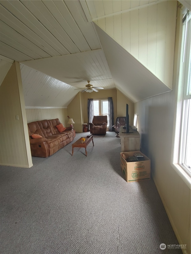 bonus room featuring ceiling fan, carpet flooring, and vaulted ceiling