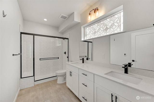 bathroom with toilet, tile patterned flooring, an enclosed shower, and vanity