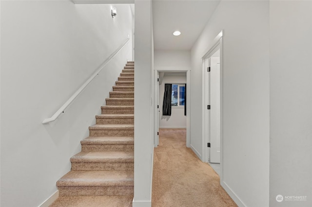 stairs with carpet floors