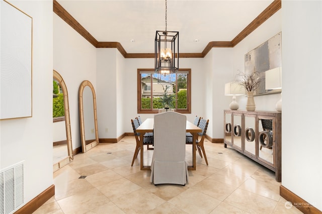 dining room with crown molding, a chandelier, and light tile patterned flooring