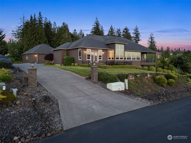 view of front of home with a lawn