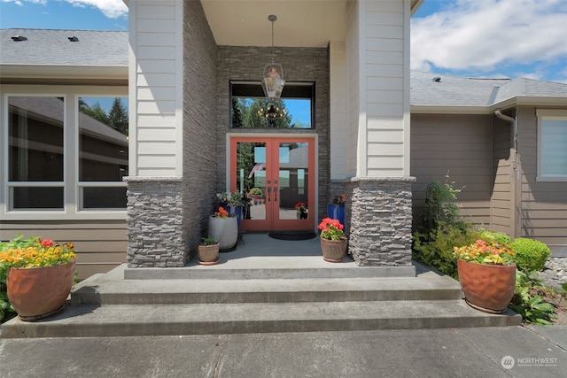 property entrance featuring french doors