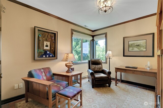 living area featuring an inviting chandelier, crown molding, and light tile patterned floors