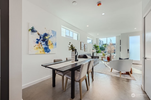 dining room featuring concrete floors