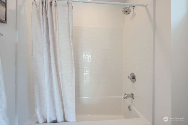 bathroom featuring shower / bath combination with curtain