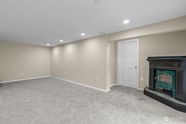 unfurnished living room featuring carpet flooring