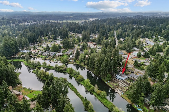 drone / aerial view with a water view