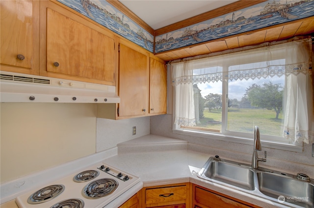 kitchen featuring white appliances and sink