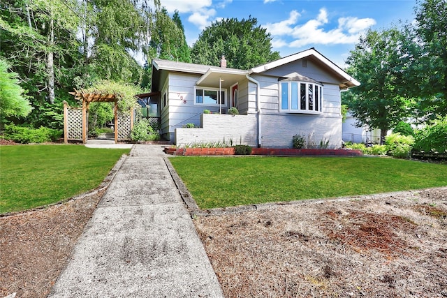 view of front of property with a front lawn