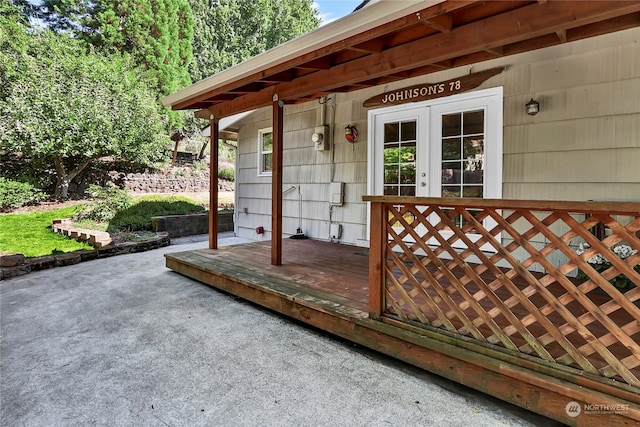 wooden deck featuring french doors