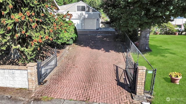 exterior space featuring a yard and an outbuilding