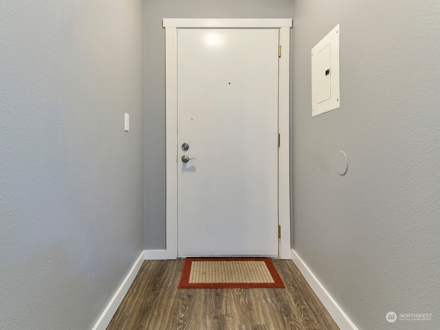 doorway to outside with dark hardwood / wood-style flooring