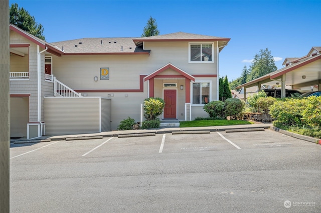 view of front of house with a carport