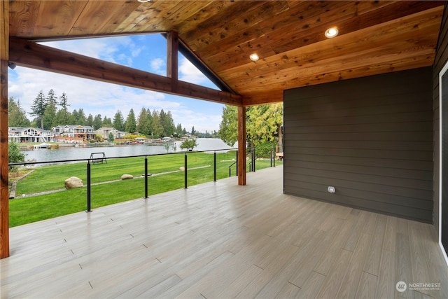 view of patio with a water view