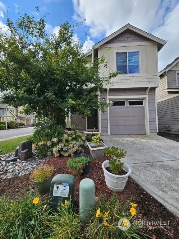 view of front of home with a garage