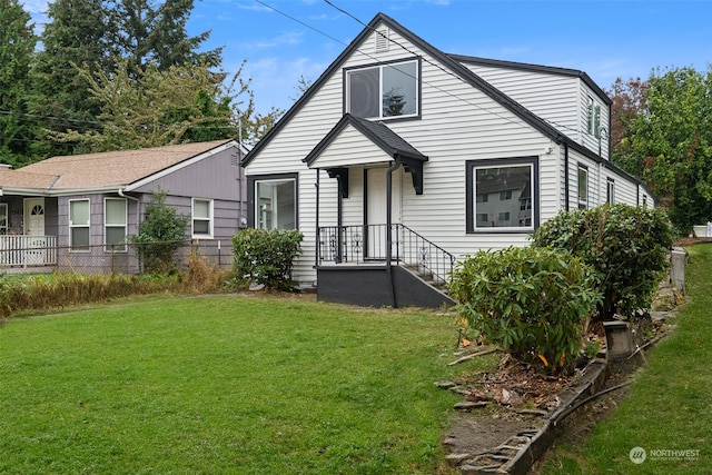 bungalow with a front lawn