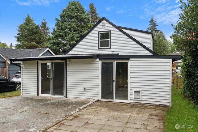 rear view of property with a patio