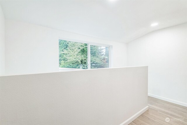 unfurnished room featuring light hardwood / wood-style floors