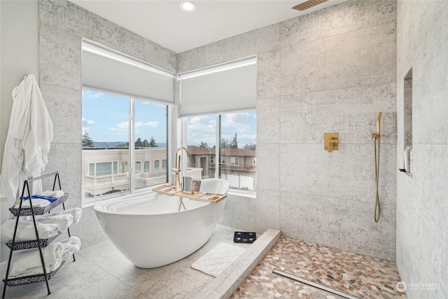 1217 S 273rd Pl, Des Moines, WA 98198 - bathroom featuring a soaking tub and a tile shower