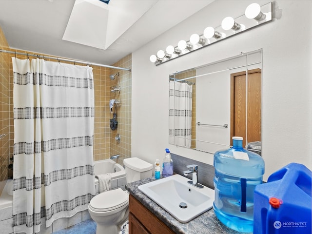 full bathroom featuring vanity, toilet, and shower / bath combination with curtain