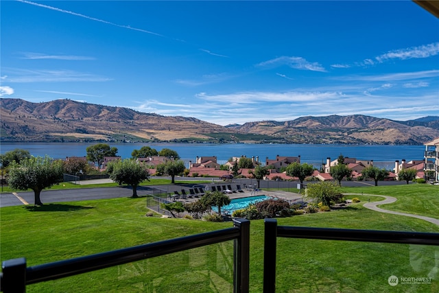 view of mountain feature featuring a water view