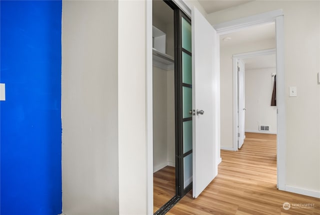 hall featuring light hardwood / wood-style floors