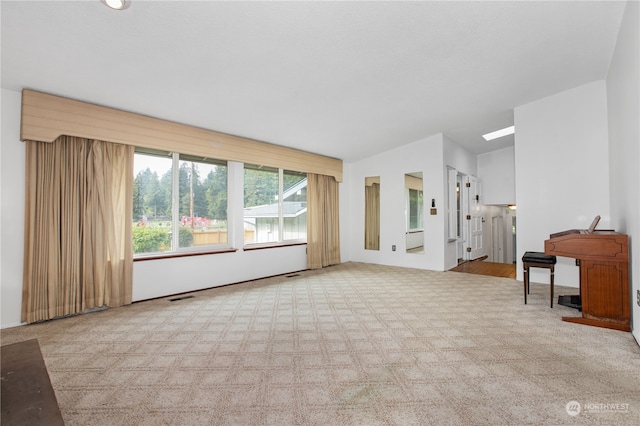 living room with light colored carpet