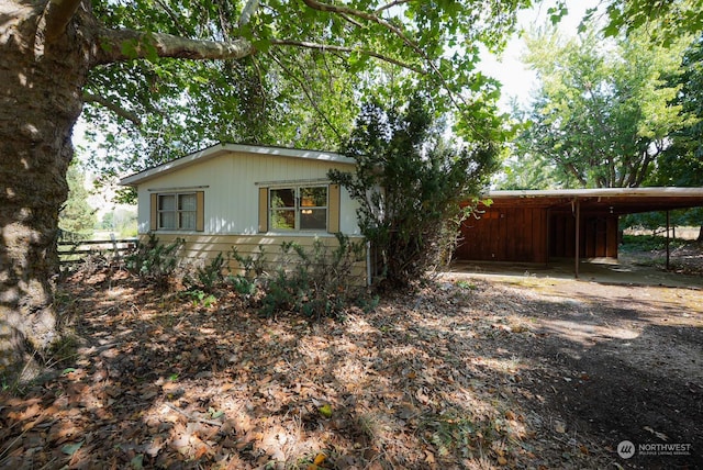 exterior space featuring a carport