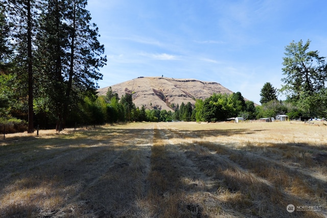 view of mountain feature with a rural view