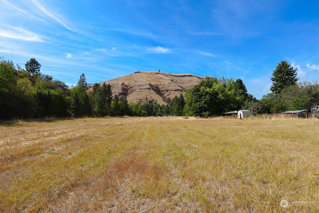 view of mountain feature with a rural view