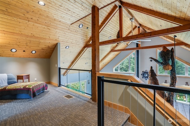 interior space featuring wooden ceiling, a wealth of natural light, and beamed ceiling