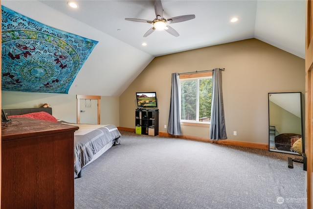 carpeted bedroom featuring ceiling fan and vaulted ceiling