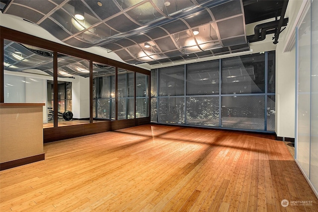 interior space with hardwood / wood-style flooring