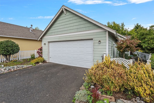 garage with wood walls