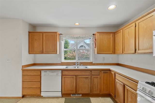 kitchen with white appliances and sink