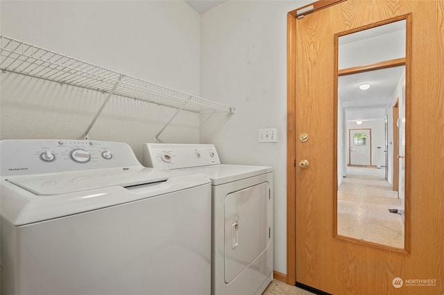 clothes washing area with independent washer and dryer