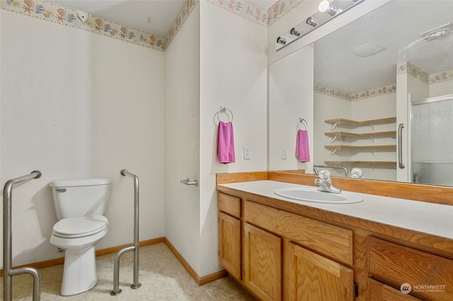 bathroom featuring walk in shower, tile patterned flooring, vanity, and toilet